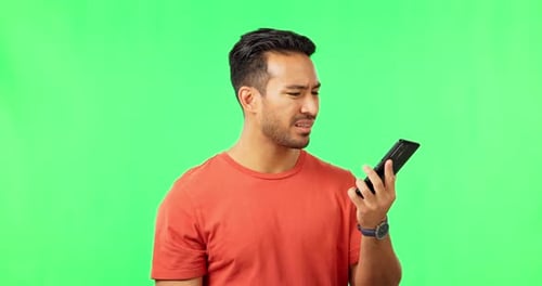 Error, connection and phone call by man in green screen studio with problem