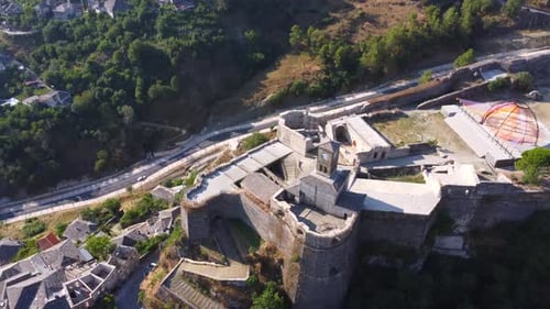 Aerial drone view of the old castle and fortress of the city of Gjirokaster or gjirokastra, Albania.