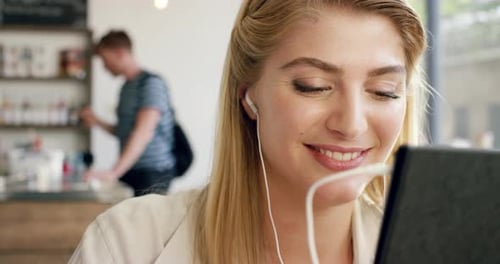 Communication, tablet and woman on a video call at a cafe drinking coffee talking