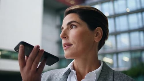Woman Using Smartphone in Urban Setting