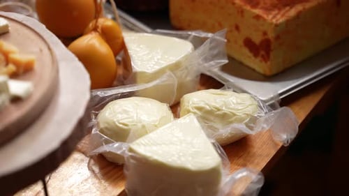 Assorted Cheeses Arranged on a Table