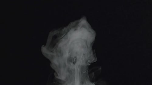 Abstract White Smoke Rising on Black Background