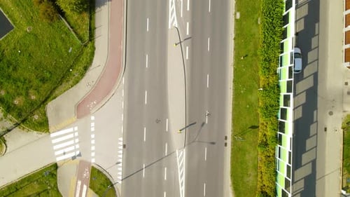 Aerial - following highway road near Gdynia Witomino city, Poland, moving backward shot