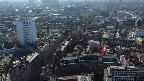Cinematic Aerial Panorama of Central London Revealing Iconic Skyline with Landmarks Like London Eye