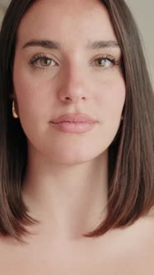 Vertical video, Close up of young European Woman Smiling at Home
