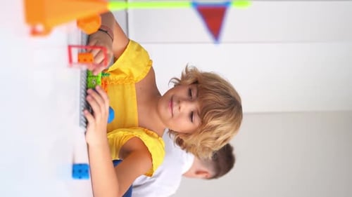 Caucasian Children Relaxing Enjoying Hobby Playing with Toy Car Remote Control Point in White