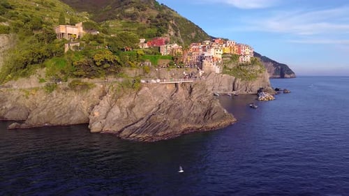 Aerial Sunset View of Manarola, a colorful Cinque Terre Village on the Italian Mediterranean Coast