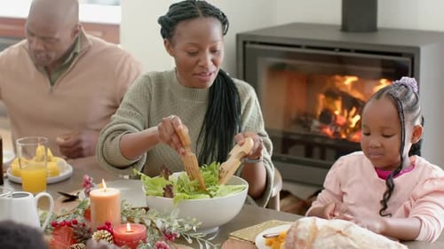 Happy Family Eating Together at Holiday Dinner