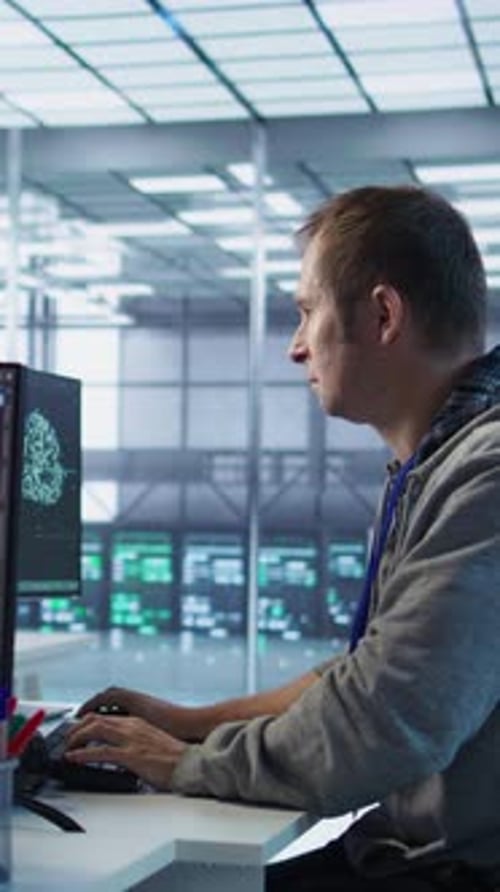 Man Requesting Help From Coworkers After Finding Bug in Data Center Systems