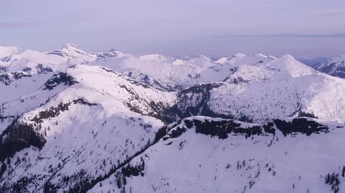 British Columbia, Canada Circa-2018. Aerial View of Snow Covered Mountain Range