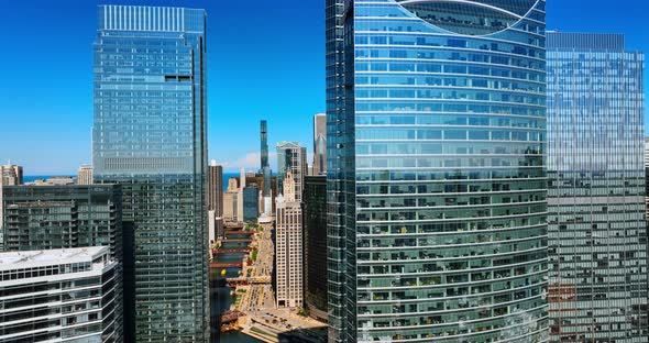 Beautiful high-rise buildings with mirror windows shining in the bright ...