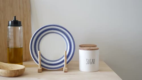 Simple Kitchenware on Light Wood Table