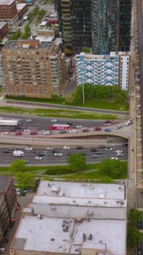 Numerous cars moving by the roads, skyways and bridges of Chicago, Illinois.