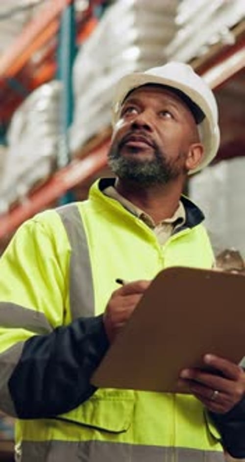 Inspection, checklist and man in warehouse with storage for stock or planning logistics
