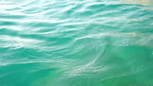 Sea Water Surface Camera Flies Over the Calm Azure Sea Nobody Holiday Recreation Concept Abstract