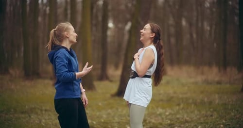 Two Woman Workout Exercising In Park Jogging Fitness