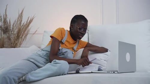 Woman Works on Laptop and Gets Headache