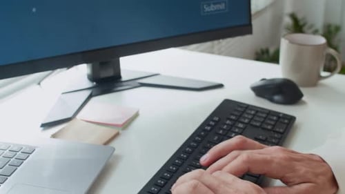 Hands of Person Typing Password when Getting Access to Computer Server
