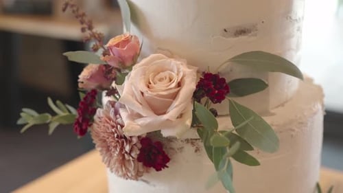 Wedding cake at a Czech wedding. A traditional symbol and a dessert that the couple will cut. Floral
