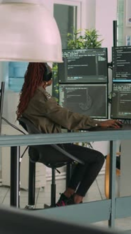 Vertical Video Software Developer Typing Programming Code on Computer Keyboard