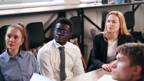 Business Presentation in a Modern Office Setting
