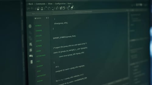 Close Up of Lines of Code Running on Computer Display in Modern Data Center