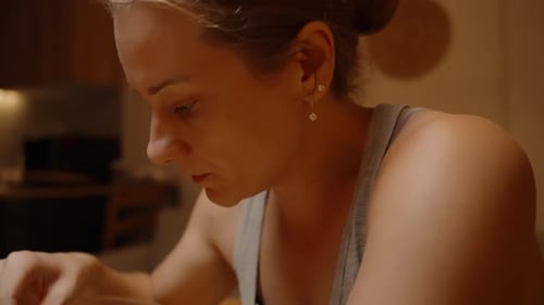 Woman Eats Popcorn for a Quick Snack