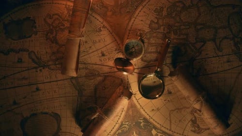 Vintage Navigation Tools with Aged Maps