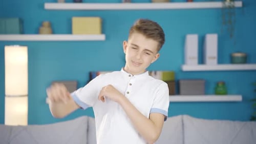 Teen Dances Energetically in Contemporary Room