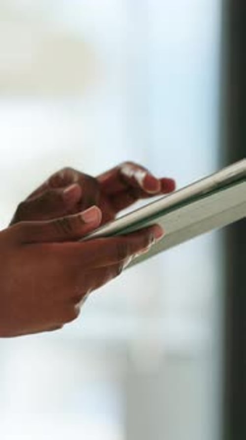 Hands, person and typing with tablet in office for research, editing article