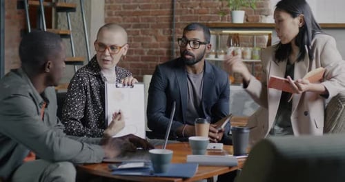 Diverse Team Collaborates in a Modern Workplace