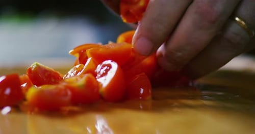 Chef Cutting Tomatoes