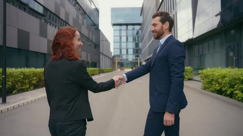 Back View Successful Business Partners Colleagues Walk in City Male Female Businessman Businesswoman