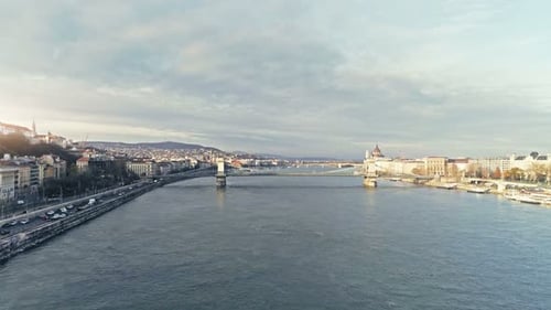 Aerial view of cityscape with river and bridge