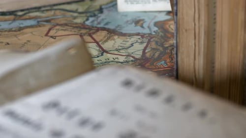 Old Ancient Bible and Map, Tilt, Close Up