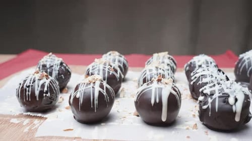 Vegan homemade sweets made from nuts and dried fruits. Chocolate balls.