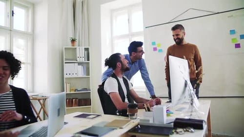 Young Business Team Collaboration in Modern Office