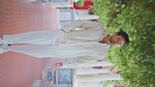 Relaxed Macho Walking Viewpoint Alley Vertical Handsome Man Taking Smartphone