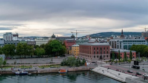 Oslo downtown cloudy Timelapse skyline traffic flow amond city