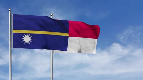 Nauru and Indonesia National Flags Waving Against Blue Sky