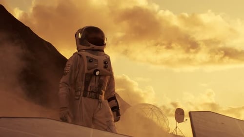 First Astronaut On the Mars, Checking His Rover and Exploring Site near His Base/ Research Center.