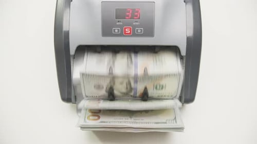 Money Counter Machine Counts Hundred Dollar Bills