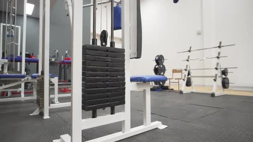 Empty Gym Full of Weight Machines and Equipment