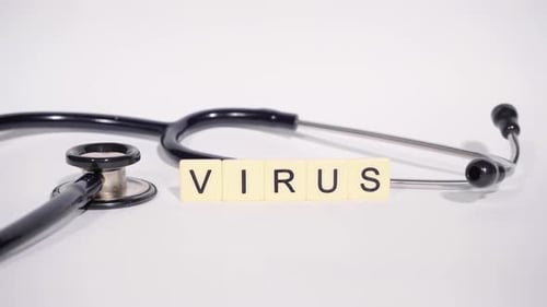 Stethoscope and Virus Tiles on White Background