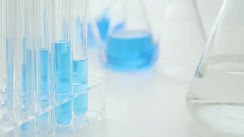 Test Tubes with Blue Liquid in Laboratory