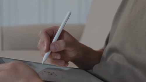 Hand Drawing on Tablet with Stylus Close Up