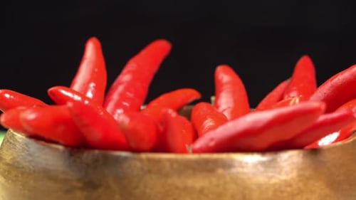 Red Chili Peppers in a Wooden Bowl