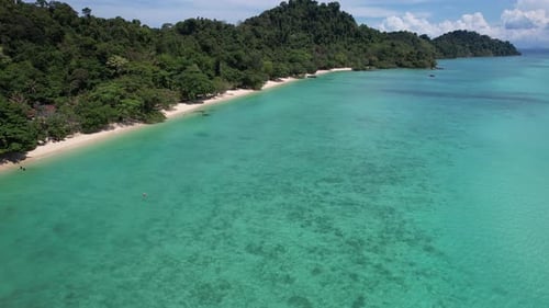 Clear sea water and the white beach of Koh Kradan island the best beach in the wold 2023.