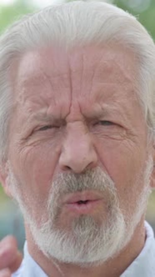 Close up of Senior Old Man Face with Toothache, Outdoor, vertical video