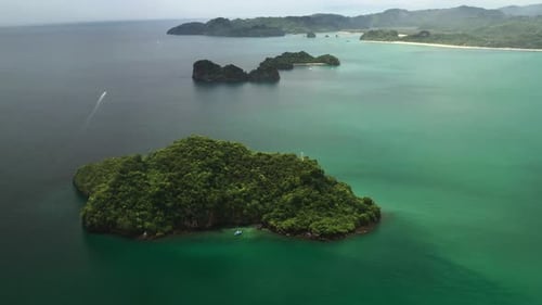 Overgrown with green jungles and tropical islands in Kilim Park on Langkawi Island, surrounded by cl